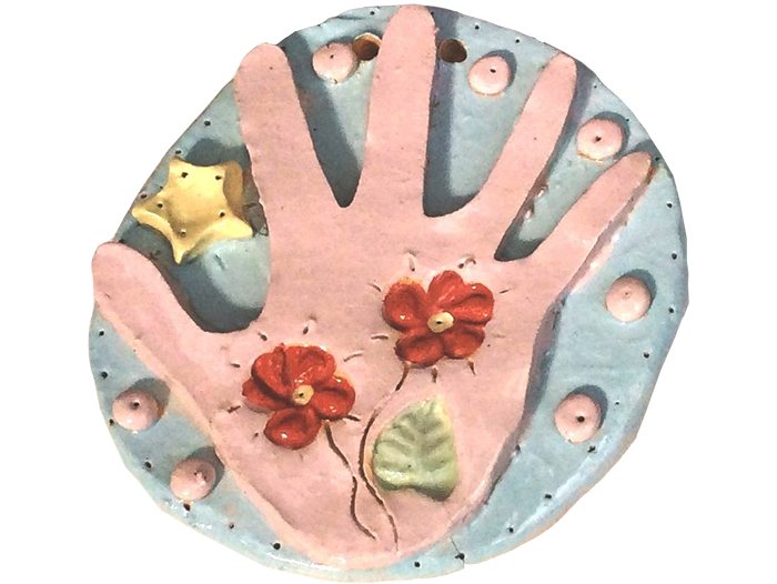 Hand on Plaque